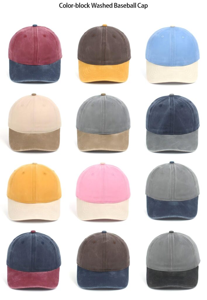 A collection of color-block washed baseball caps, featuring various dual-tone combinations in a vintage, distressed style.
